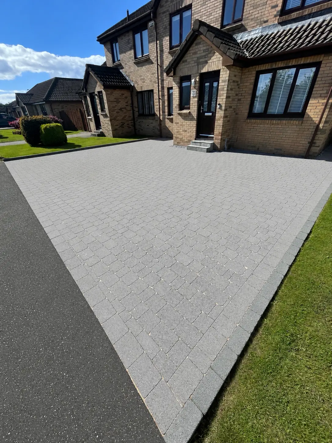 A professionally cleaned block-paved driveway in Erskine