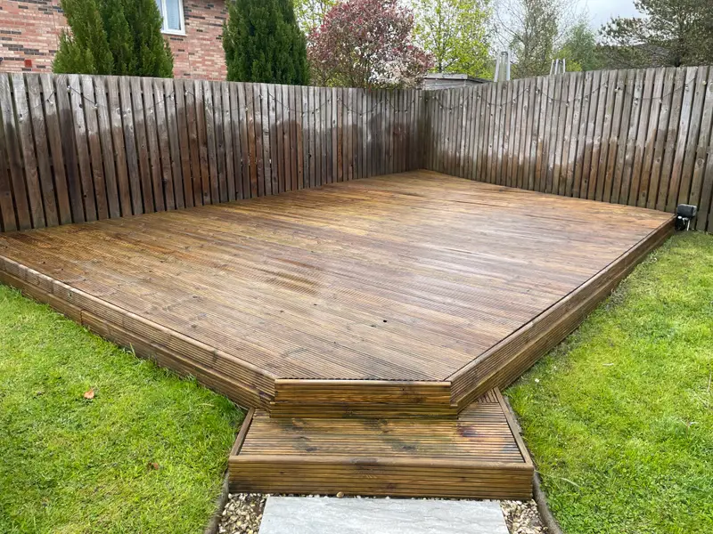 Warm wooden decking after cleaning in Dargavel